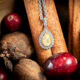 Pear Shaped Yellow Diamond Halo Pendant